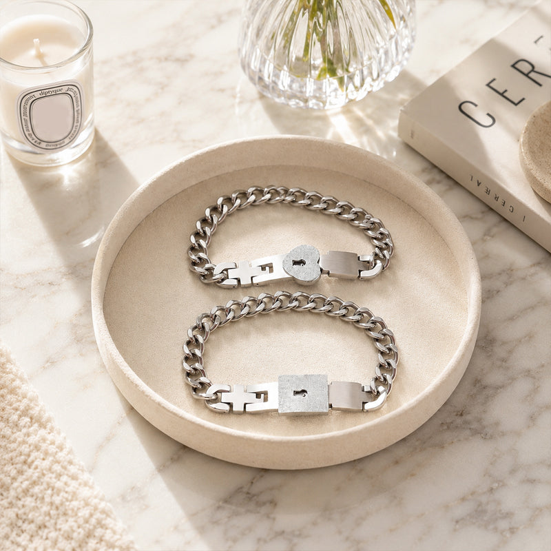 Matching bracelets with a heart-shaped lock 💕