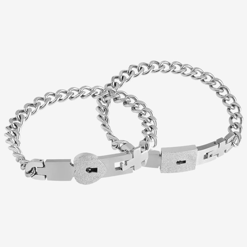 Matching bracelets with a heart-shaped lock 💕