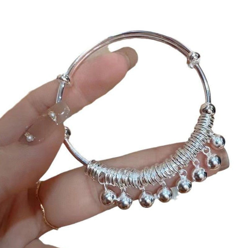 ✨ Adjustable Silver Bell Charm Bangle Bracelet
