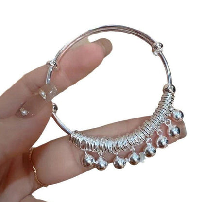 ✨ Adjustable Silver Bell Charm Bangle Bracelet